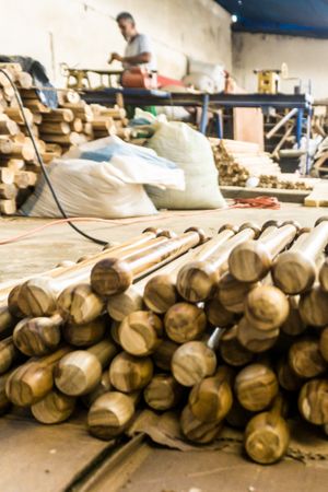 Heap of wooden sticks at workplace