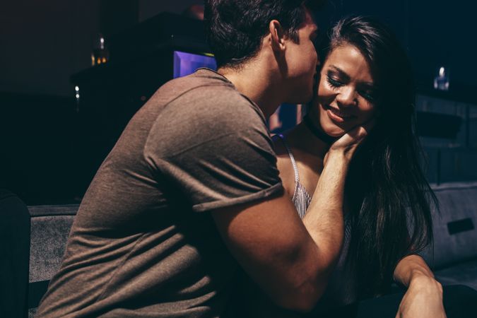 Romantic couple flirting at nightclub