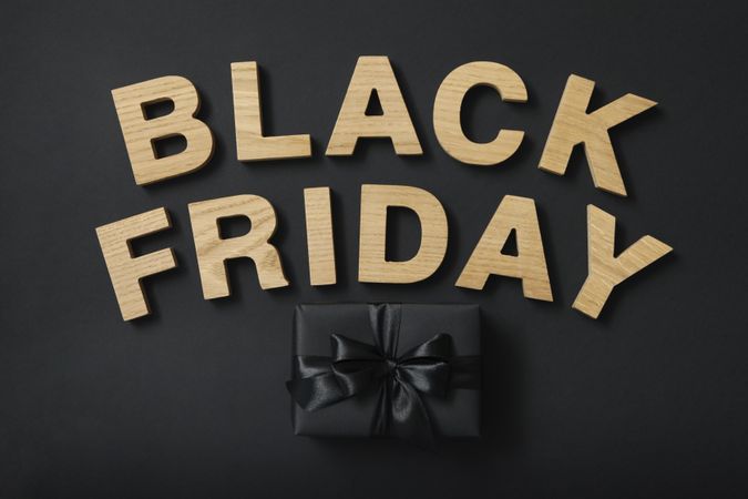Text, gift box on dark background