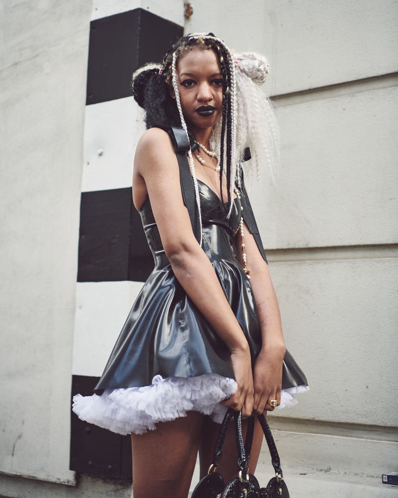 London, England, United Kingdom - September 18 2021: Woman in gothic dress with monochrome braids