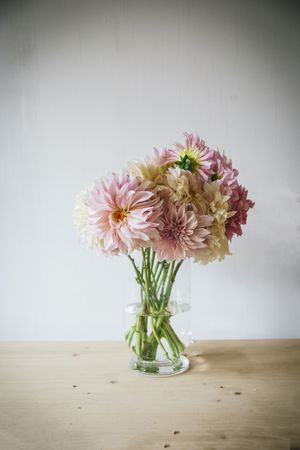 Bunche of flowers in vase on table
