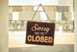 Close sign at small business window