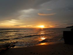 sunset with calm sea waves