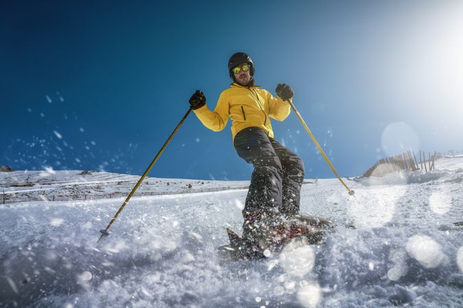 Man skiing on winter day