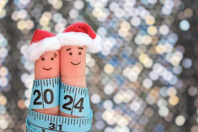Fingers art of couple celebrates Christmas.