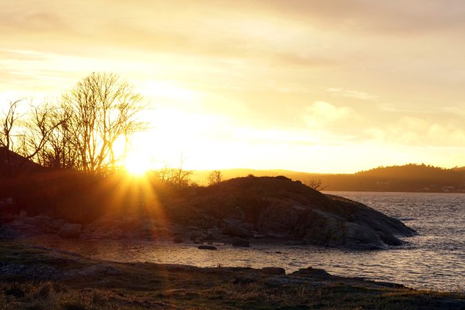 Peaceful seashore lake at sunset