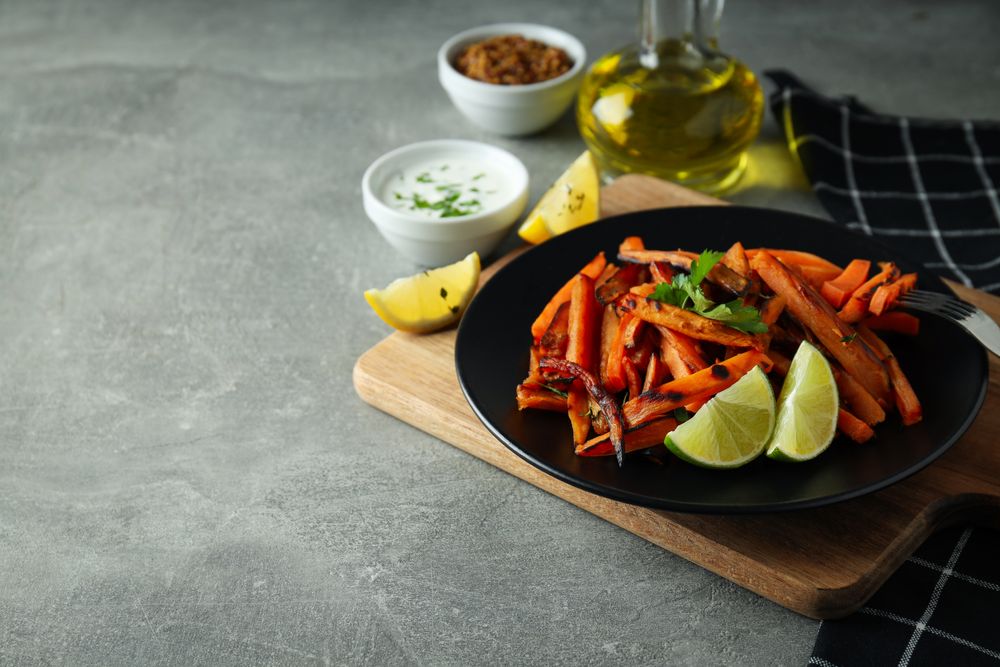 Concept of tasty food, fried sweet potato, space for text