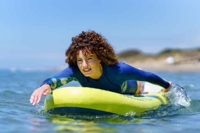 Woman on board in the ocean