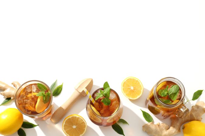 Cold tea with fresh oranges and mint leaves