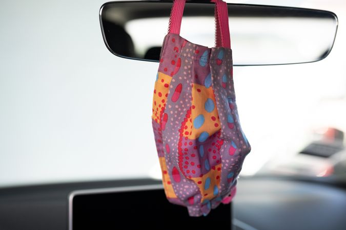 Brightly colored cotton mask hanging car mirror