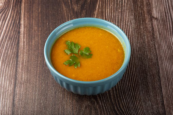 Delicious homemade pumpkin soup in bowl.