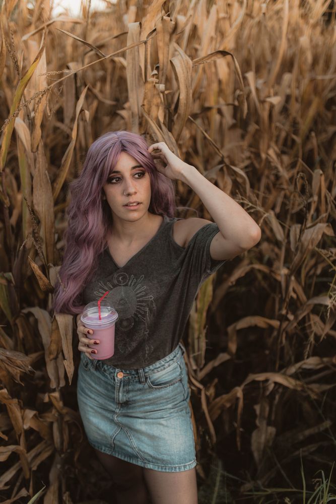 Casual woman in dry vegetation