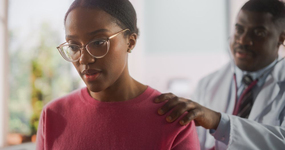 Portrait of a Professional Black Physician Using Stethoscope to Diagnose Any Lung Issue of a Recovering Patient