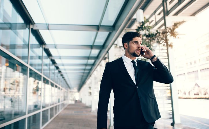 Traveling businessman making a phone call