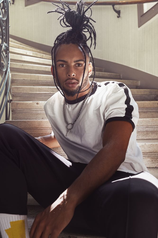 Black male with trendy hairstyle