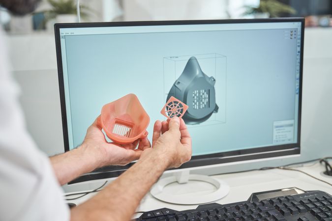 Anonymous engineer with 3D face mask