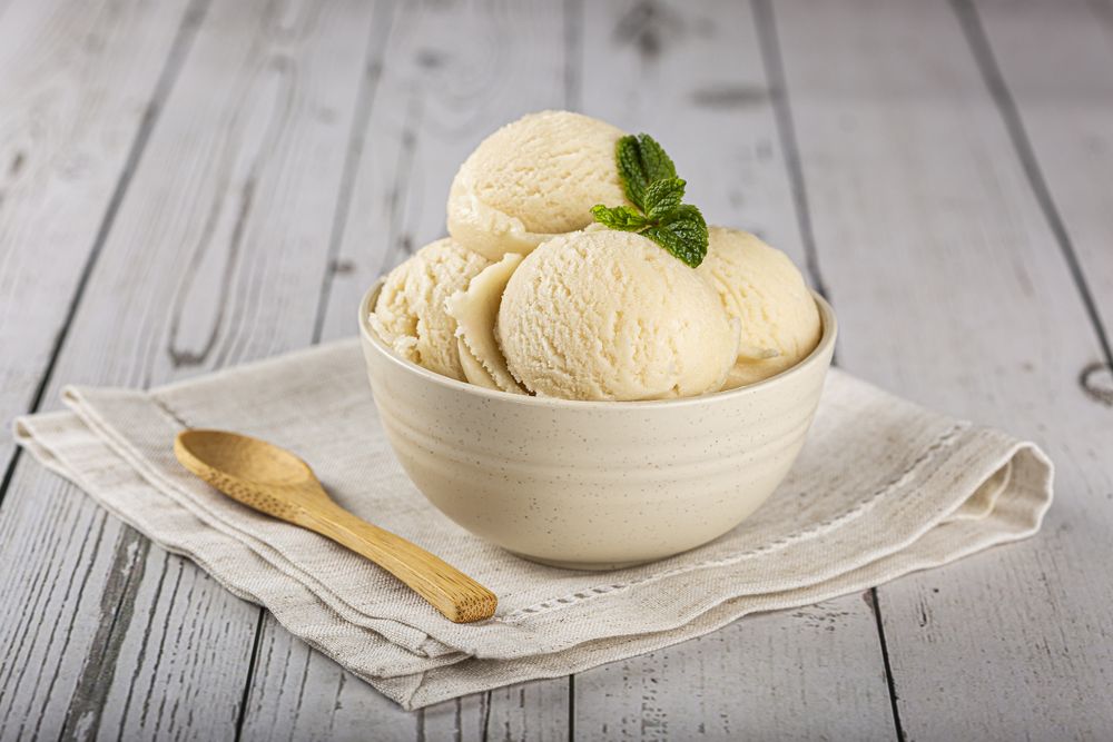 Bowl with vanilla ice cream balls.