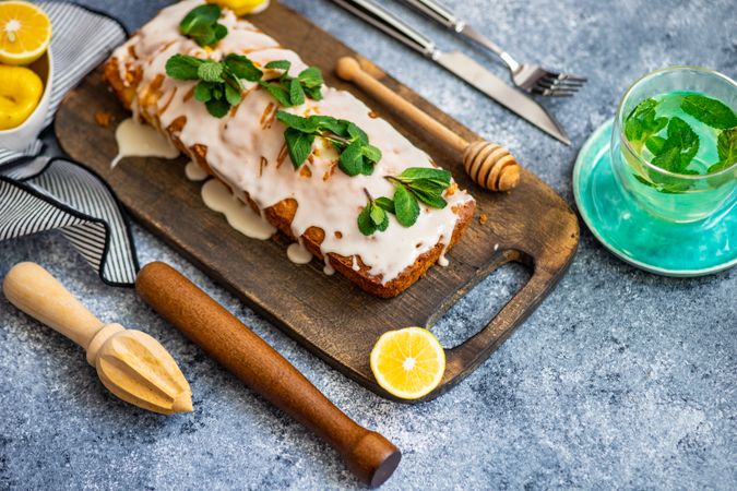 Fresh baked lemon cake dessert on cutting board with copy space