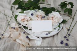 Festive floral composition with English roses, lavender, ribbon with blank business card, wedding invitation mockup 47ag60