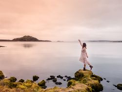 Woman posing at lake