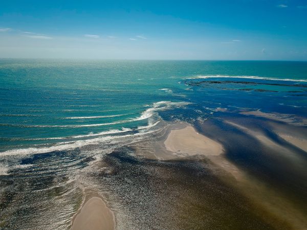 Vast view of ocean on Brazilian coast at low tide