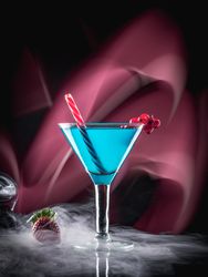 Glass with drink and berries
