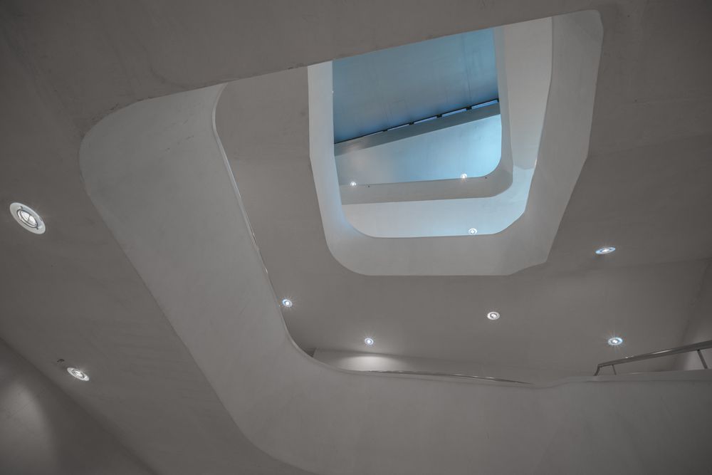 Amazing modern hall interior with white stairway