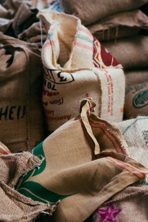 Close up of bags of coffee beans in warehouse