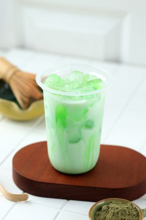 Iced Green Tea Syrup on Plastic Cup