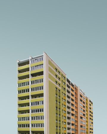 Green and orange apartment buildings