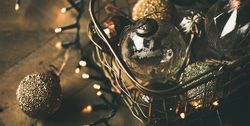 Christmas tree decorations in wire box, close up