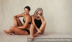 Cheerful mature women  laughing together in a studio 5QRvm4