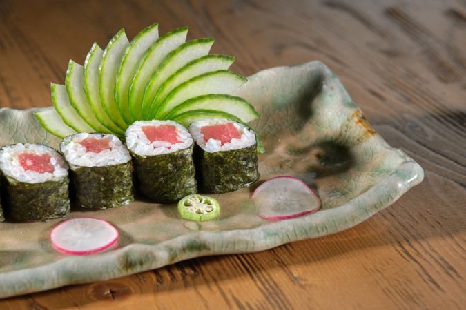Set of fresh tuna rolls on marble plate