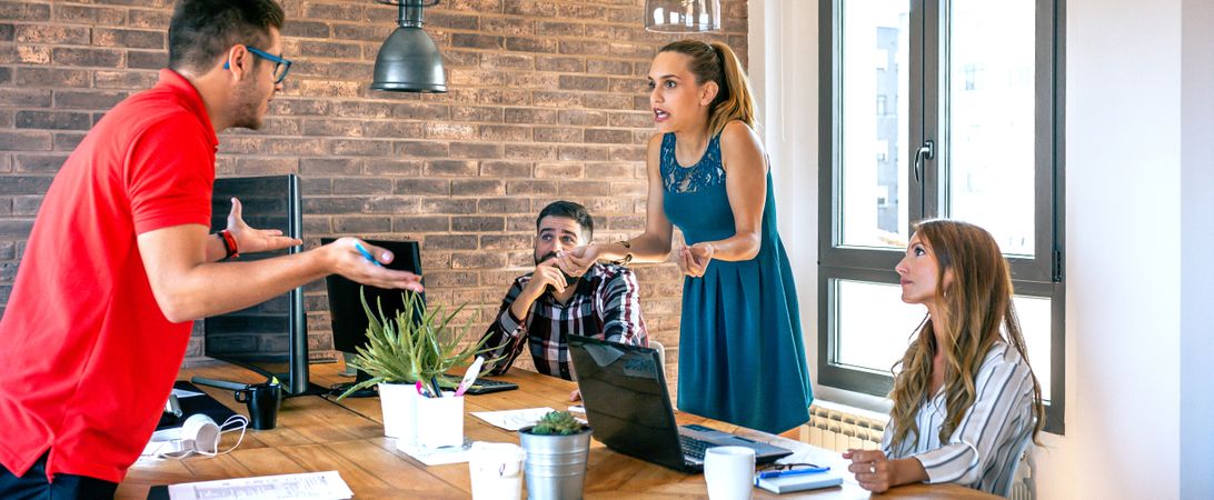 Coworkers arguing in the office