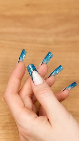 Creative Blue Glitter Nail Artistry