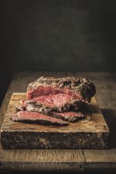 Roast beef on cutting board