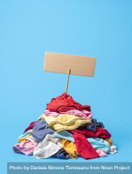 Clothes pile on a blue background 0LnOE4