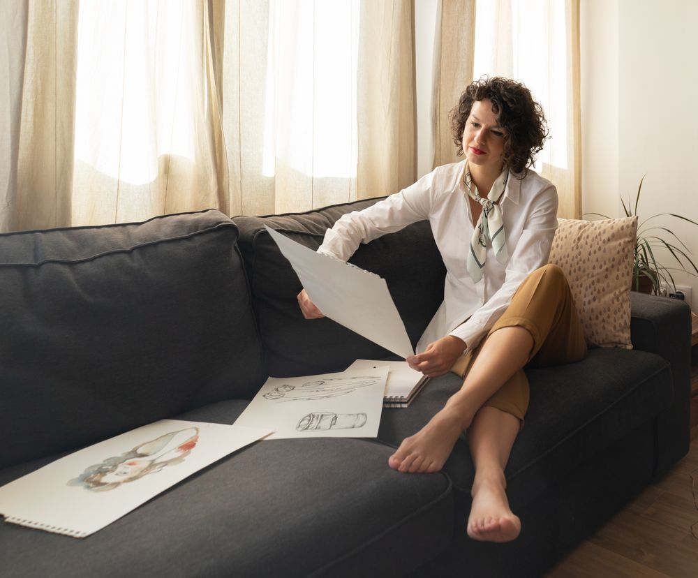 Woman with draws on papers