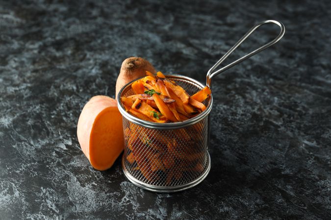 Concept of tasty food - sweet potato fries