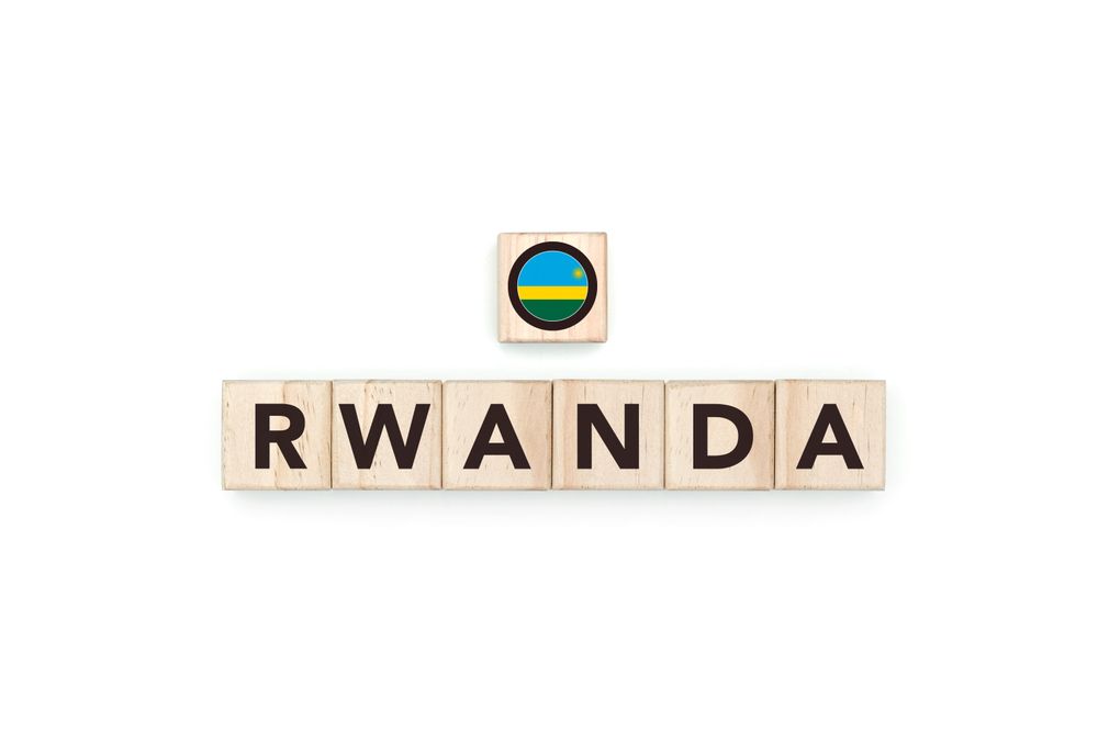 Wooden blocks bearing the name and flag of Rwanda.