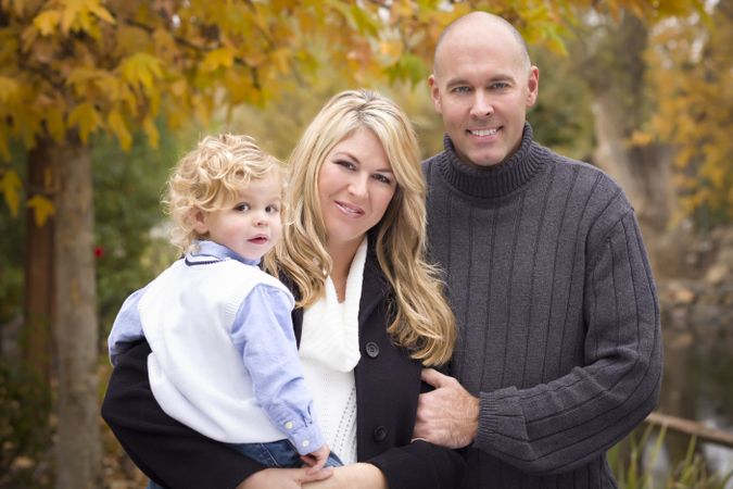 Parents and Child Portrait in Park