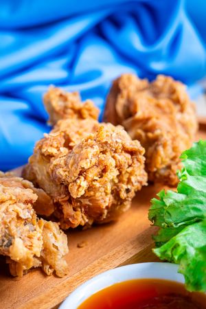 crispy fried chicken in a wooden table