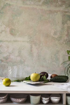 Fresh ingredients, with apple , cucumber, kiwi and avocado near recipe of Green smoothies.