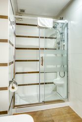 Interior of bathroom with shower cabin