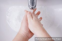 Person washing their hands bGG7xb
