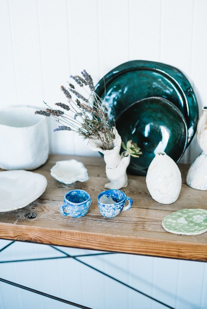 Shelf of ceramic objects in shop