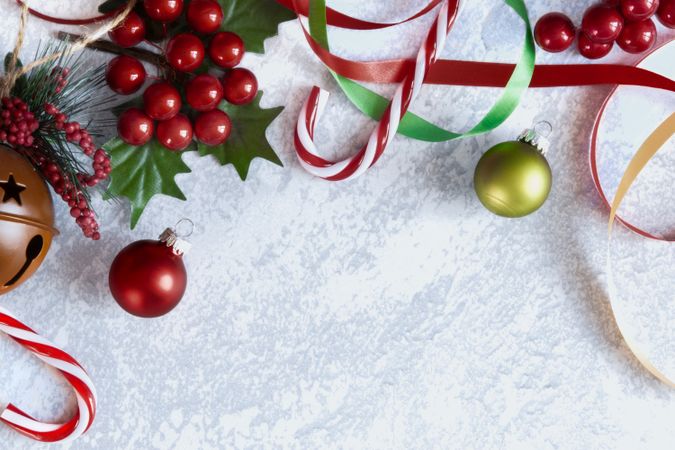 Christmas Background with Christmas decorations on a grey backdrop.
