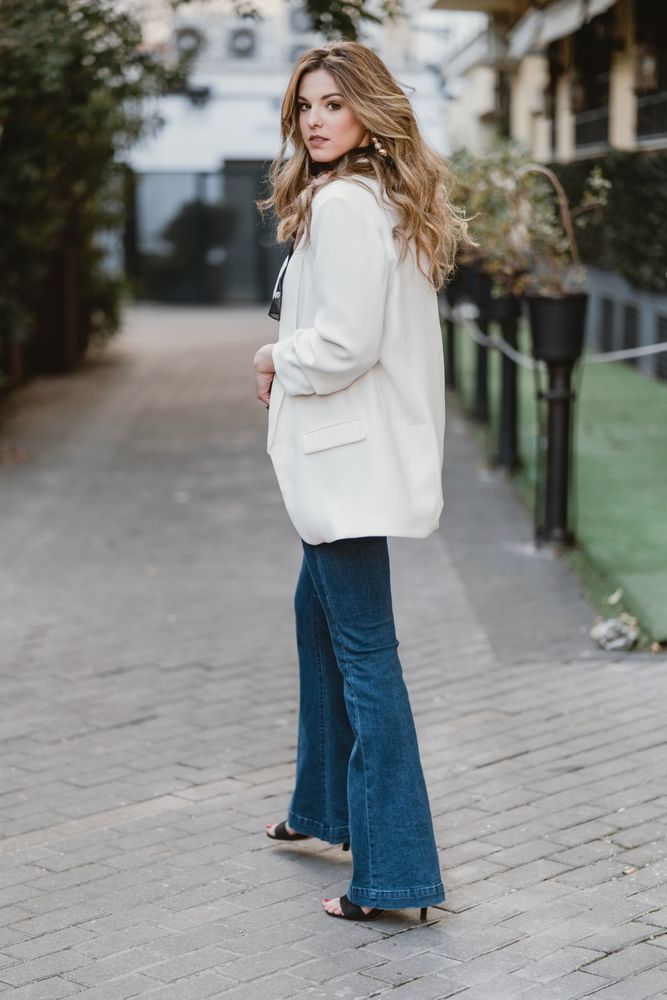 Charming woman posing on street