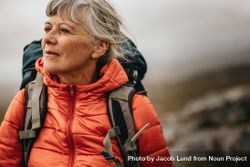 Close up of woman hiker during a trekking expedition 5Xwov0