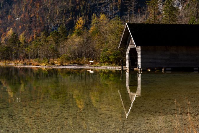 Wooden shed on lake Konigsee in an autumn scenery in the Bavarian Alps